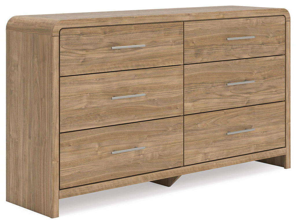 Des commodes spacieuses avec d'élégantes poignées couleur champagne complètent l'ambiance décontractée et chic.