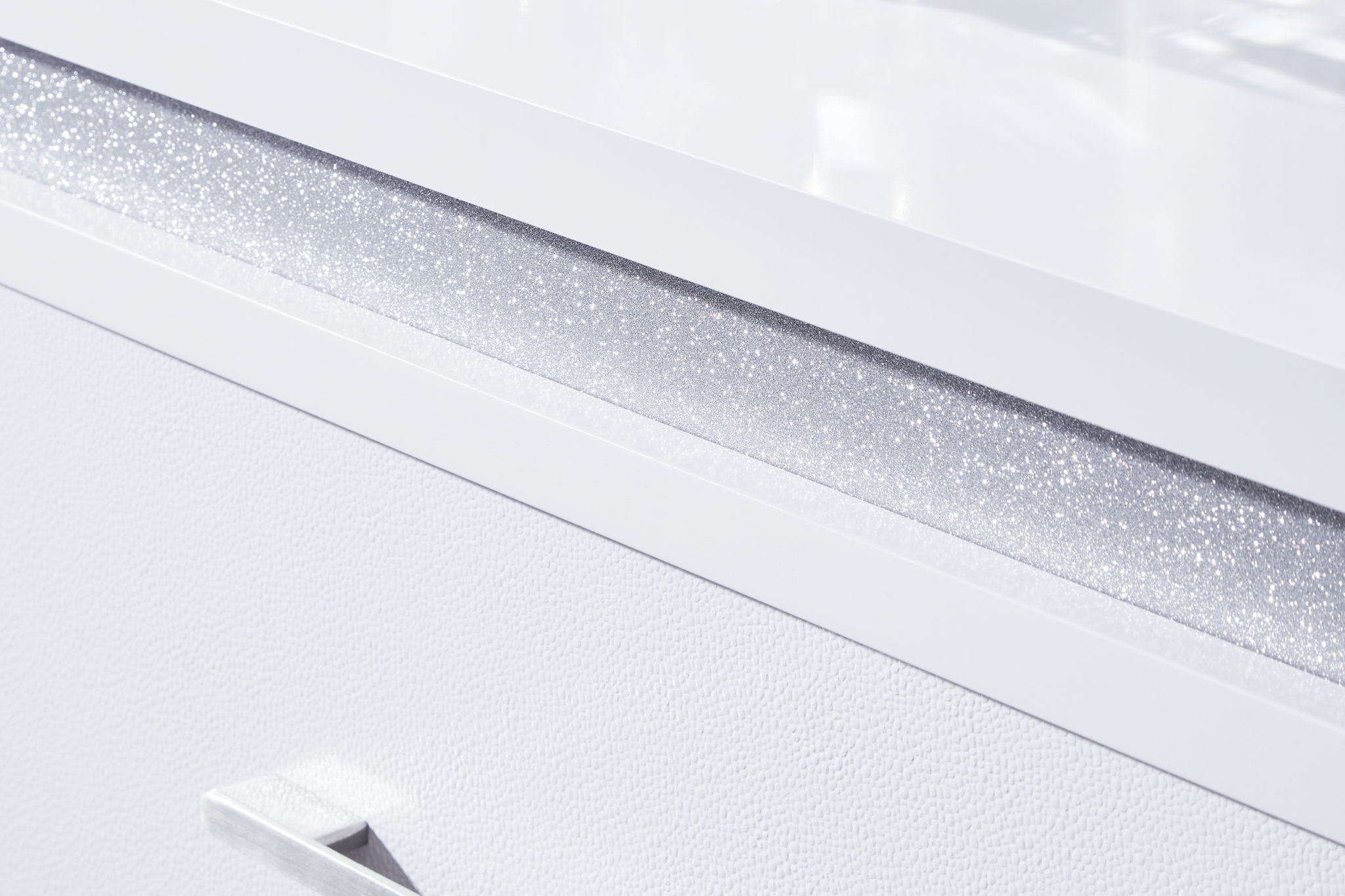 Dresser White a sleek white finish and inset glitter accents create a sophisticated feel