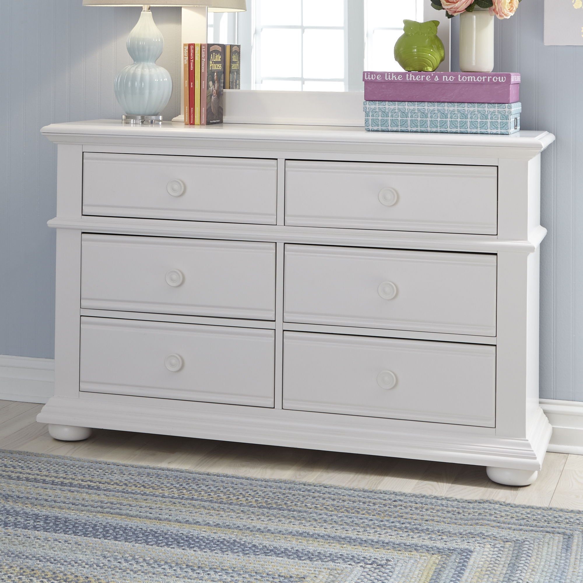 Dresser features the best of cottage with louvered panel accents in an Oyster white