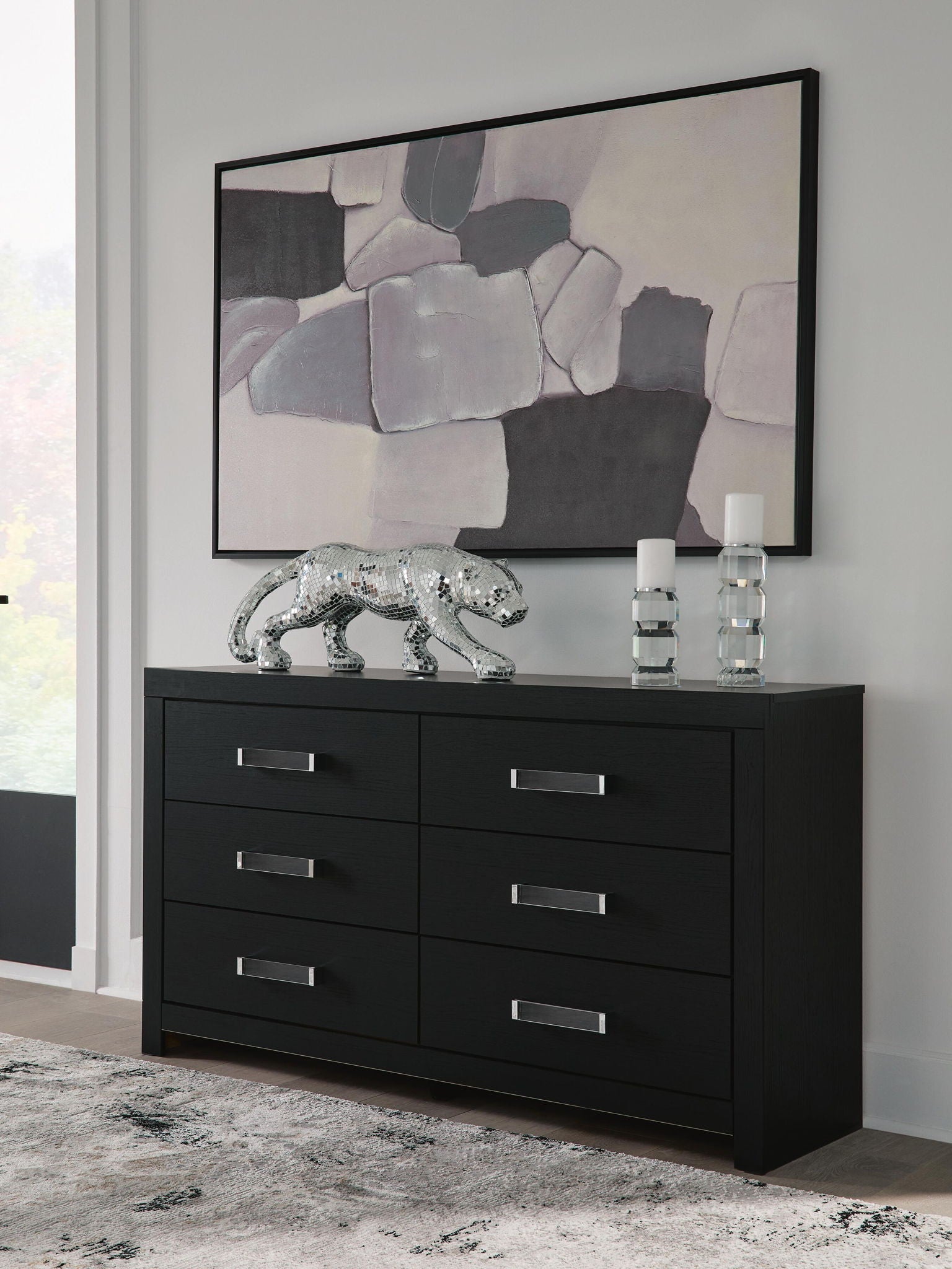 Dresser for those with a penchant for modern glamour, this dresser reflects your