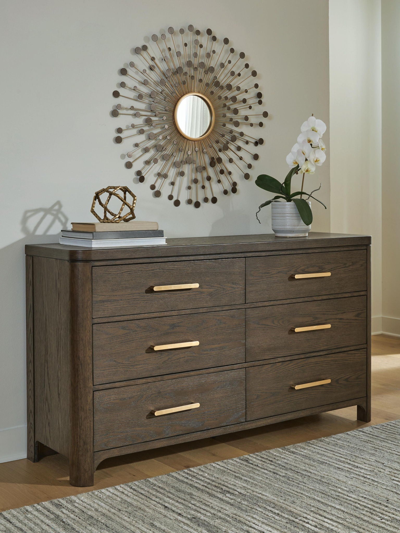 Dresser in a rich wood tone, this dresser is an expertly crafted balance of luxury and