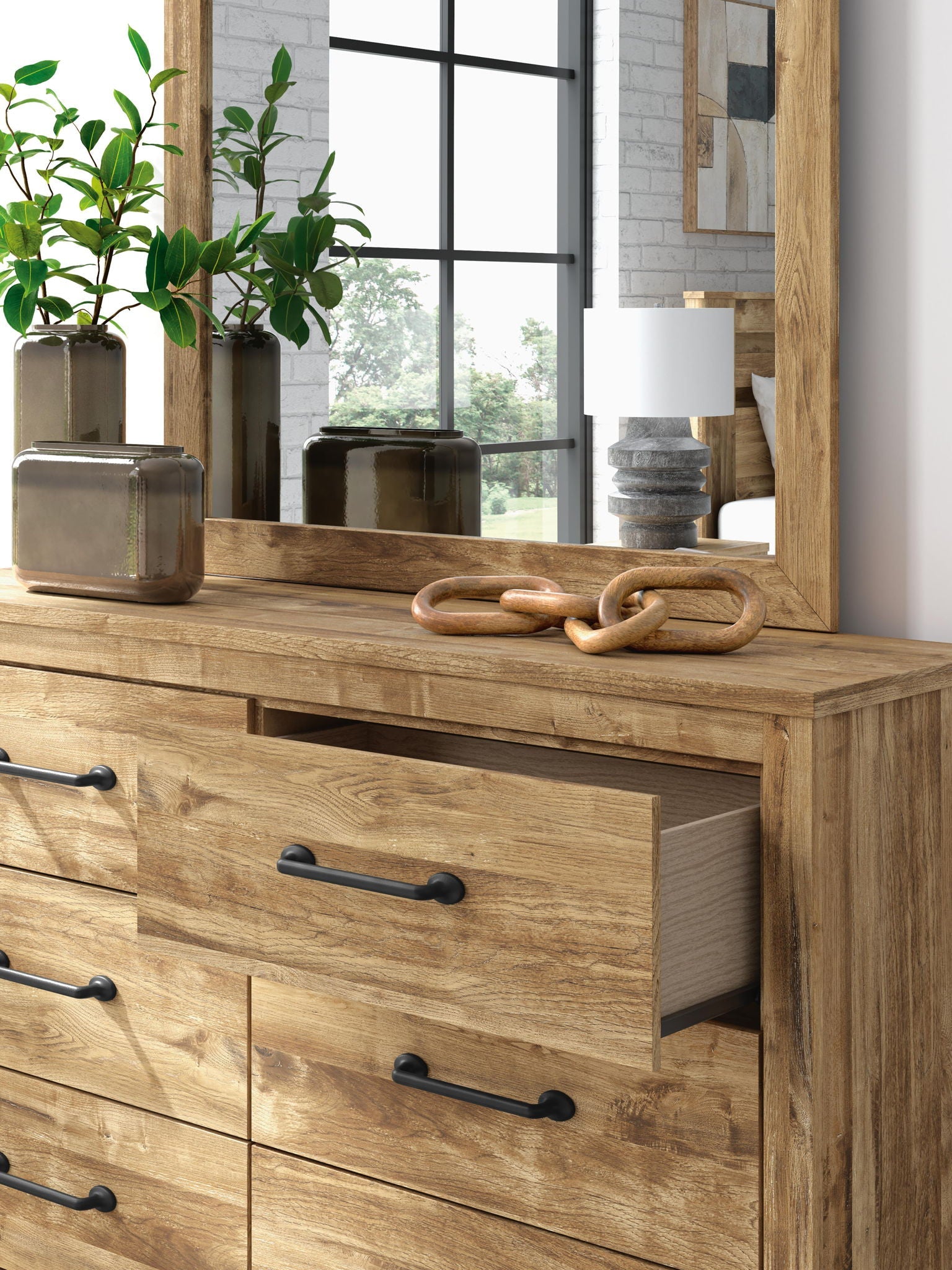Commode du chic urbain à la ferme moderne, cette pièce polyvalente reflète harmonieusement