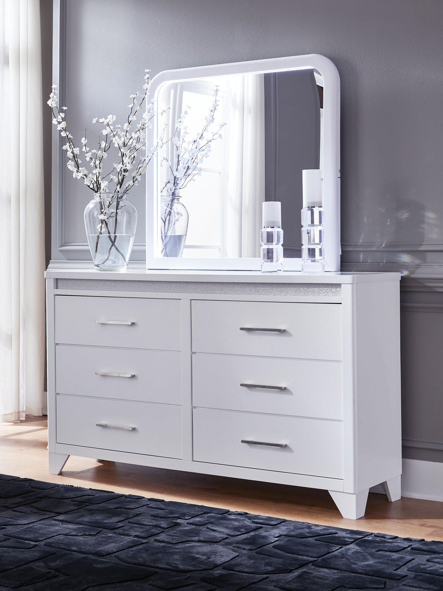 Dresser And White a sleek white finish and inset glitter accents create a luxurious feel, while