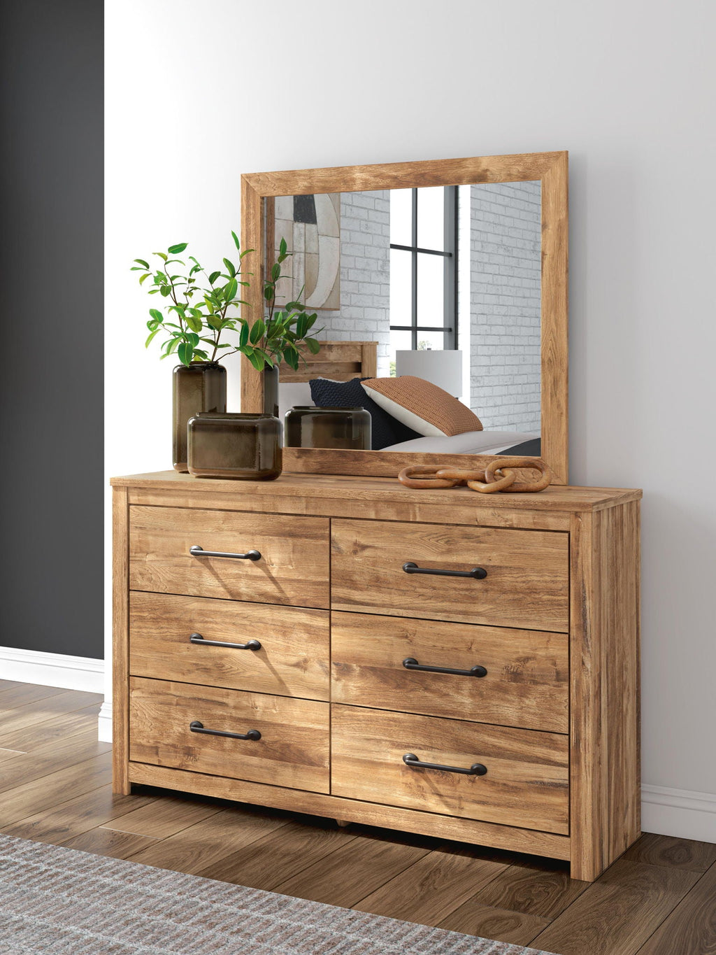 Commode du chic urbain à la ferme moderne, cette pièce polyvalente reflète harmonieusement