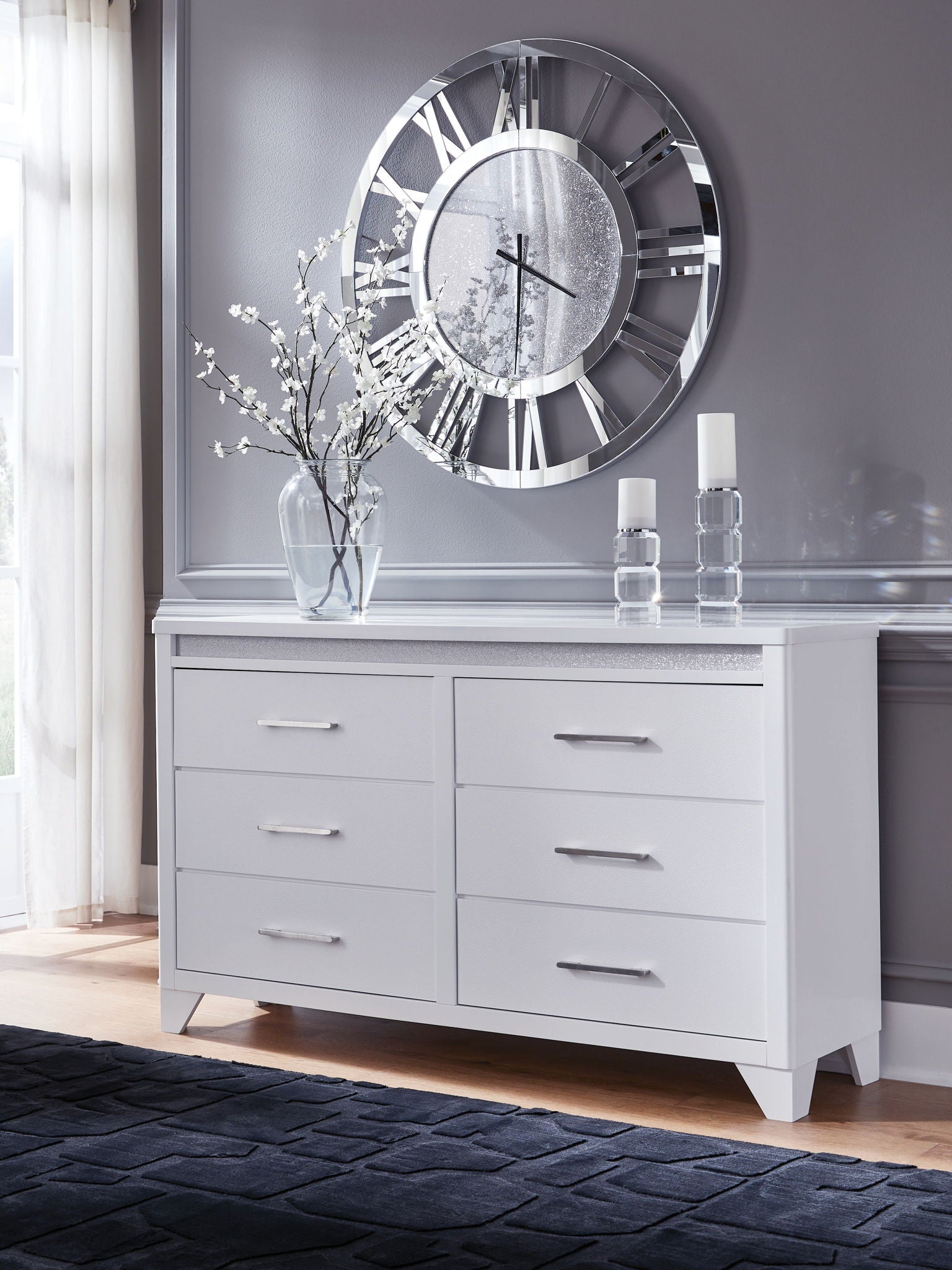 Dresser White a sleek white finish and inset glitter accents create a sophisticated feel