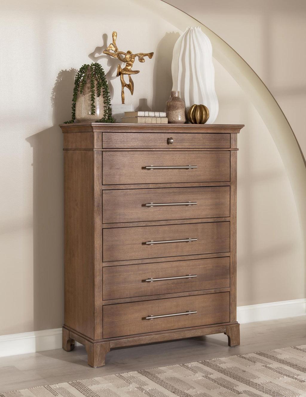 Chest crafted of Ash veneer and Select Hardwood Solids, the fresh finish delivers a